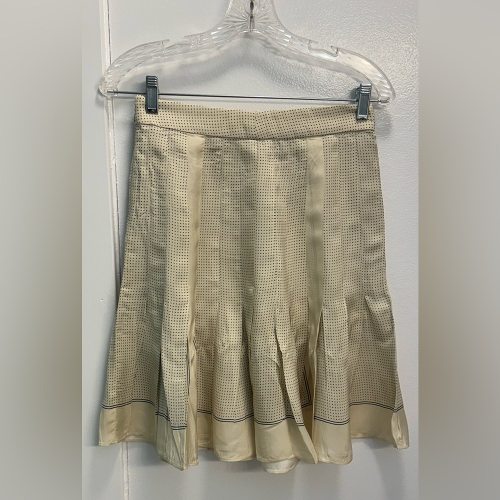 Woman’s J. Crew pleated scarf-print skirt in drapey viscose twill.